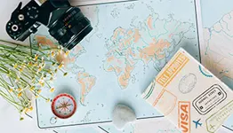 A camera, a visa and a world map